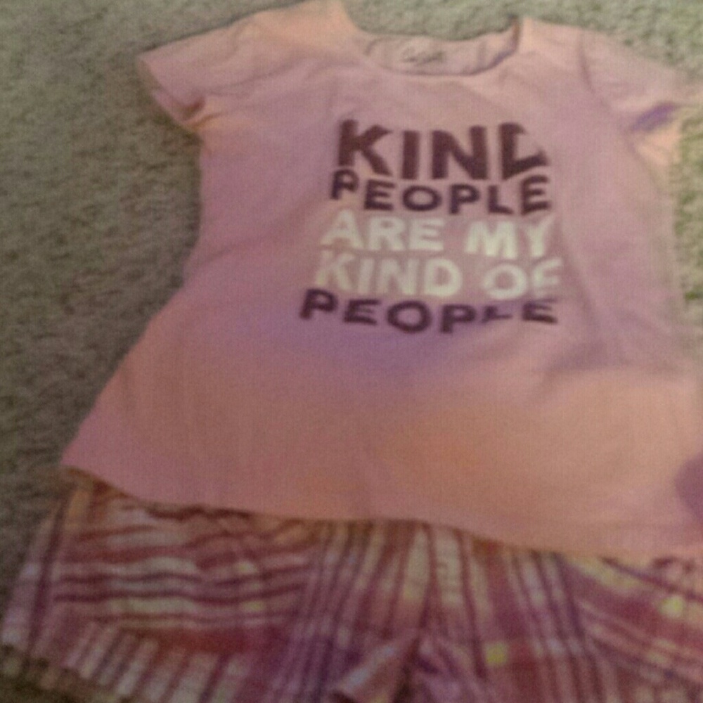 Tee with a great message and plaid shorts